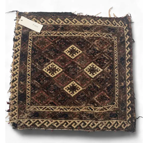 Bag face – wool, - soumac - hooked lozenge lattice - white running border – faded. 42.5 x 40cm